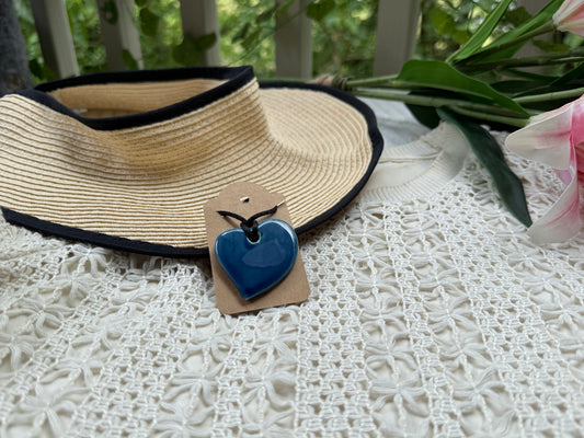 Enchanted Blue Heart Pendant with black tie cord