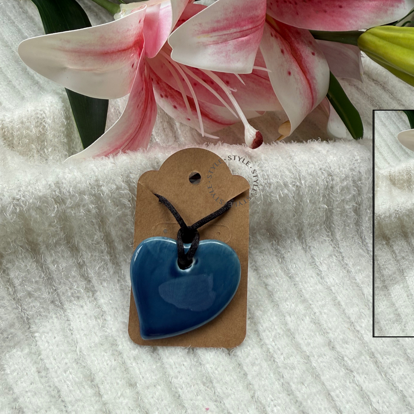Enchanted Blue Heart Pendant with black tie cord